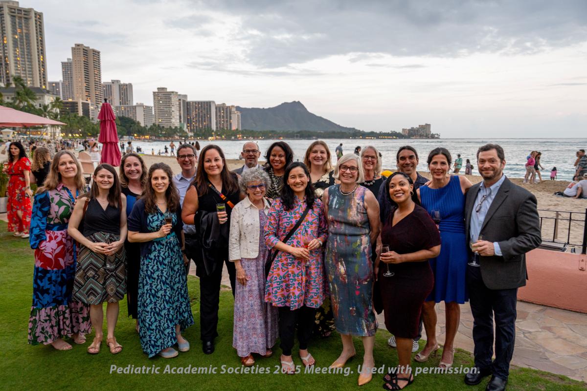 Staff and faculty in the Department of Pediatrics pose at the Howland Gala. 