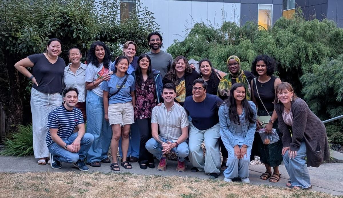 A photo of over a dozen smiling residents posing for the camera.